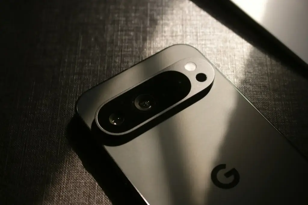 A close up of a cell phone on a table