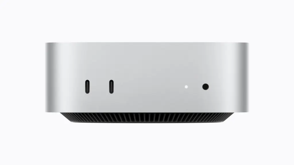 المنافذ الأمامية لجهاز Mac mini M6: منفذا USB-C ومنفذ السماعات